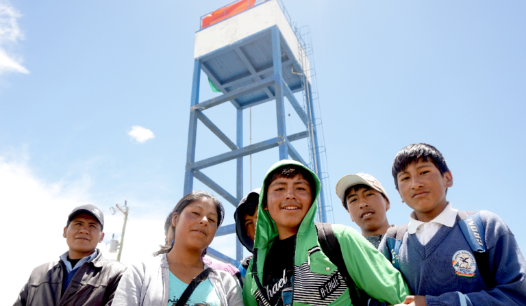 Imagen niños y tanque cooperacion delegada